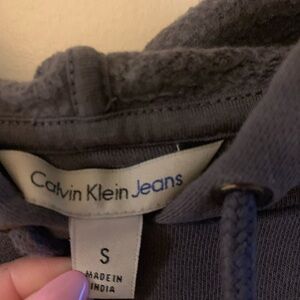 Calvin Klein Jeans charcoal hoodie with blue logo